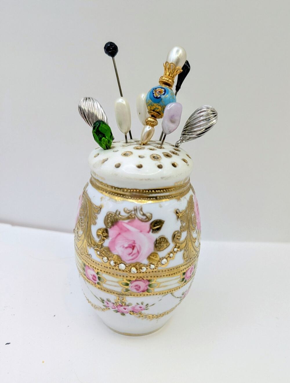 Antique Lot 9 Hat Pins in Porcelain Holder Pearl Peridot Glass Painted Bead Jet